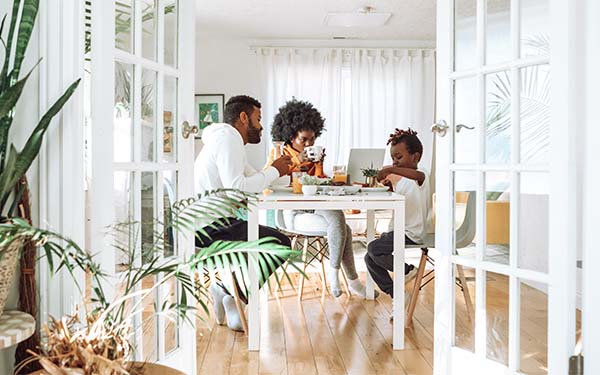 family at a table eating together